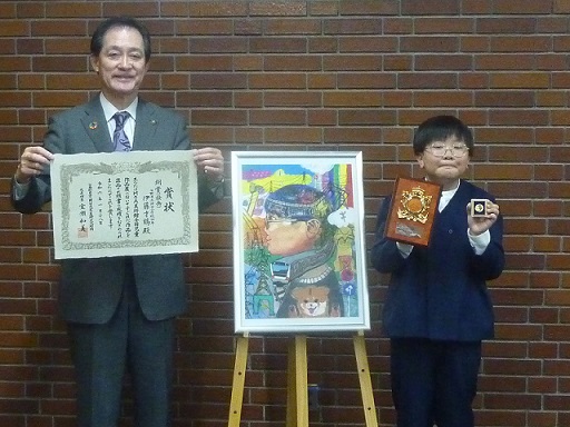 顕彰の様子の写真