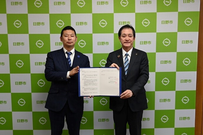 協定締結式の写真