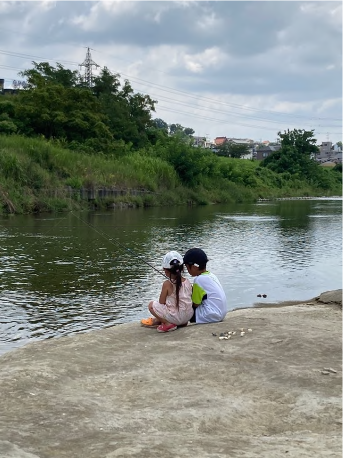 写真:『小さな釣り人』