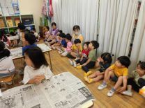 写真:とうもろこしの皮むき8